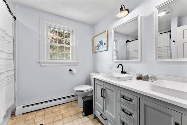 26 Dodge Rd, Sutton, MA 01590 - full bath featuring baseboard heating, double vanity, toilet, and a shower with shower curtain