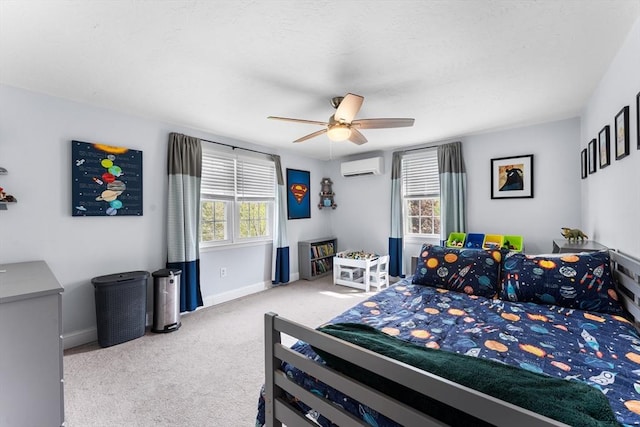 26 Dodge Rd, Sutton, MA 01590 - bedroom featuring a wall mounted AC, carpet flooring, baseboards, and a ceiling fan