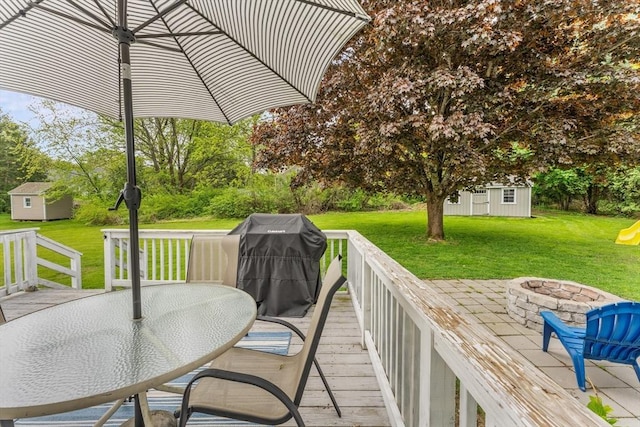 26 Dodge Rd, Sutton, MA 01590 - wooden terrace featuring an outdoor fire pit, a lawn, and outdoor dining space