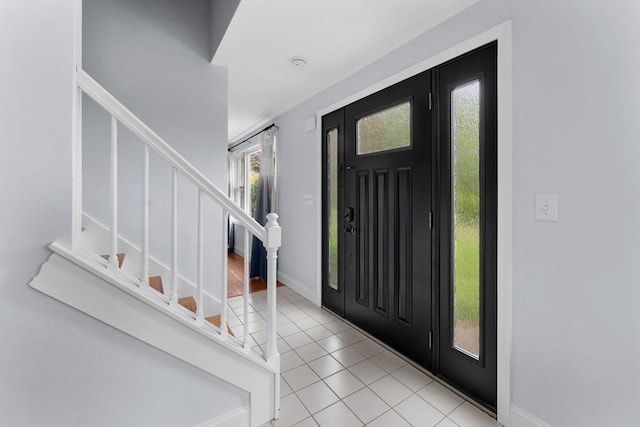 26 Dodge Rd, Sutton, MA 01590 - tiled entrance foyer featuring stairs and baseboards