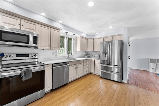 26 Dodge Rd, Sutton, MA 01590 - kitchen with appliances with stainless steel finishes, light countertops, a sink, baseboards, and recessed lighting