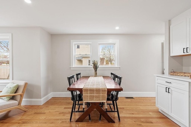dining space featuring recessed lighting, baseboards, visible vents, and light wood-type flooring