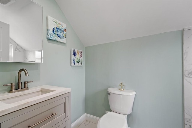 bathroom with visible vents, marble finish floor, vaulted ceiling, and toilet