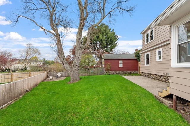 view of yard with a fenced backyard and a patio area