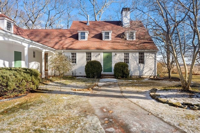 view of new england style home