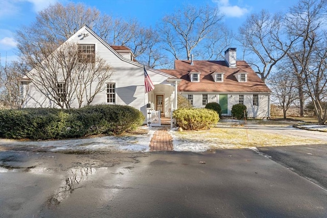 view of new england style home