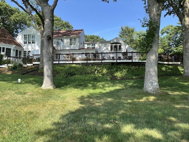 view of yard with a deck