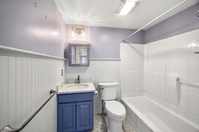 full bathroom with vanity, bathing tub / shower combination, and toilet