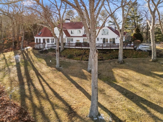 view of yard with a wooden deck