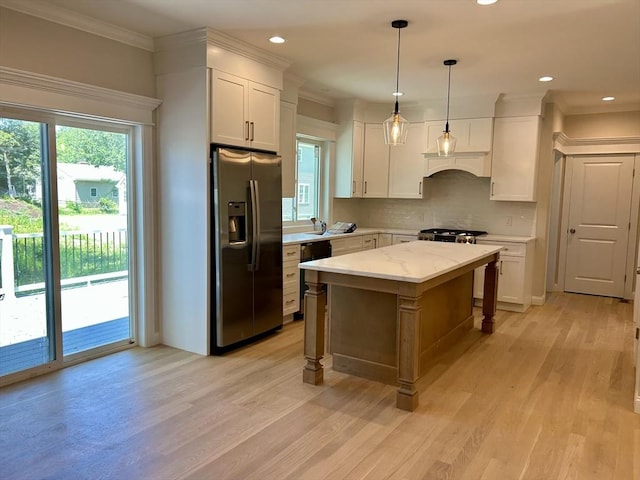 6 Knott St, Attleboro, MA 02703 - kitchen with stainless steel appliances, light wood-type flooring, white cabinets, tasteful backsplash, and recessed lighting