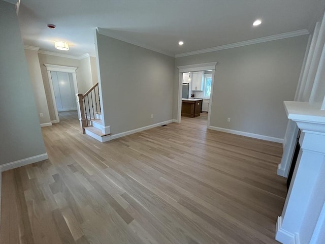 6 Knott St, Attleboro, MA 02703 - unfurnished living room featuring light wood finished floors, crown molding, stairs, and recessed lighting