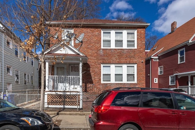 view of front of property featuring brick siding