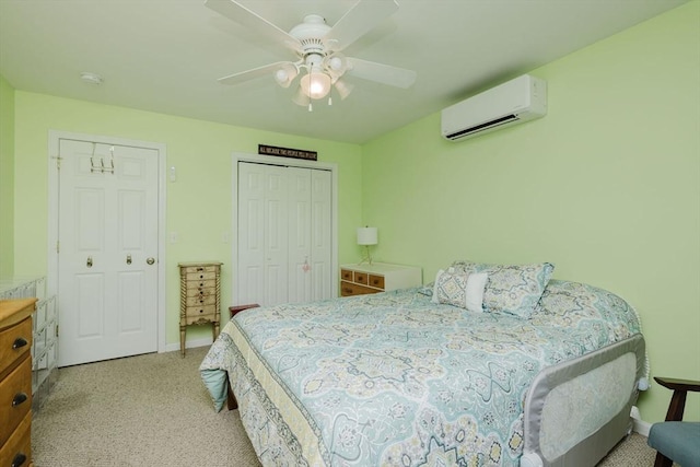 85 Evelyns Way, Fall River, MA 02724 - bedroom with a wall unit AC, light carpet, a closet, and a ceiling fan