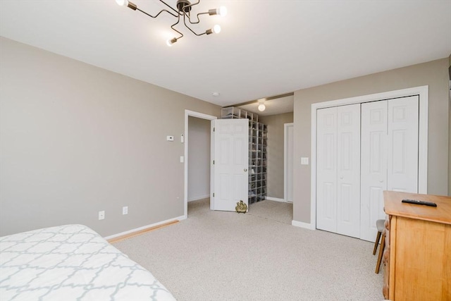 85 Evelyns Way, Fall River, MA 02724 - bedroom featuring light carpet, a closet, and a chandelier