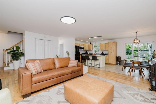 85 Evelyns Way, Fall River, MA 02724 - living area featuring light wood finished floors, healthy amount of natural light, a chandelier, and recessed lighting