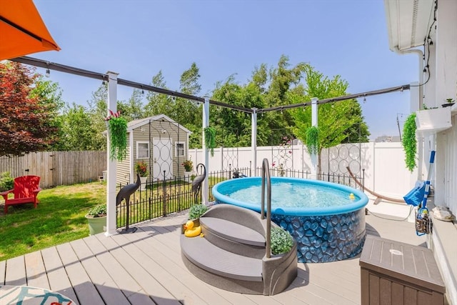 85 Evelyns Way, Fall River, MA 02724 - view of pool featuring a storage unit, a fenced backyard, and a deck