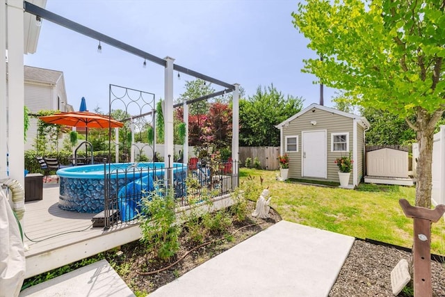 85 Evelyns Way, Fall River, MA 02724 - fenced backyard featuring a storage unit and a wooden deck