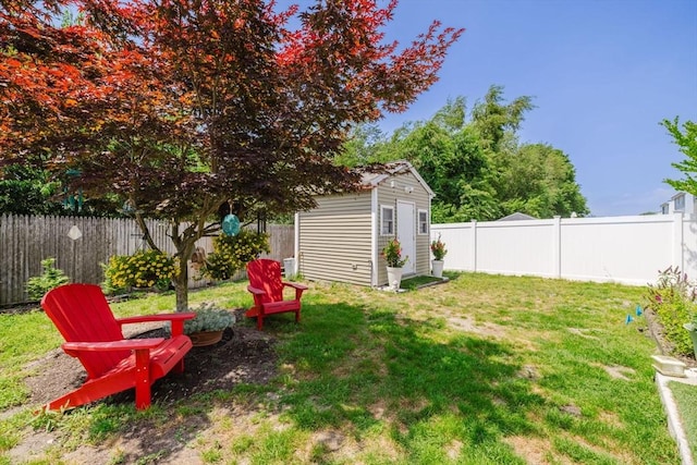 85 Evelyns Way, Fall River, MA 02724 - fenced backyard featuring a storage shed