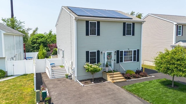 85 Evelyns Way, Fall River, MA 02724 - view of front of property featuring a gate and solar panels