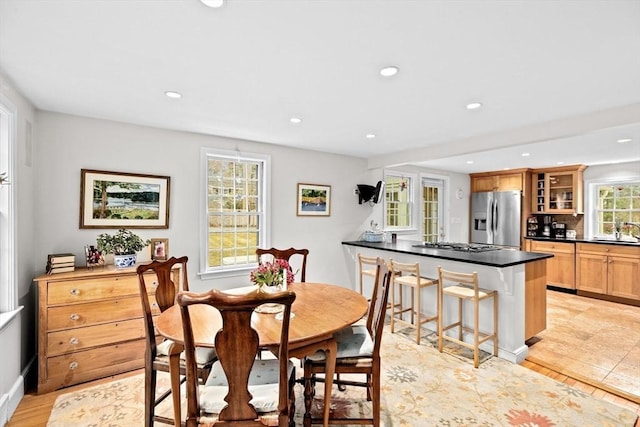 dining space with recessed lighting