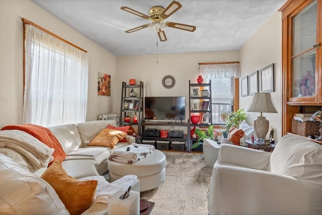 living room featuring ceiling fan