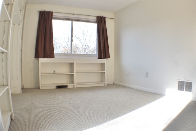 interior space with visible vents and baseboards