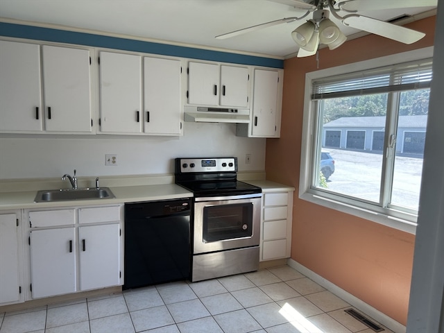 kitchen with dishwasher, sink, light tile patterned floors, white cabinets, and electric stove