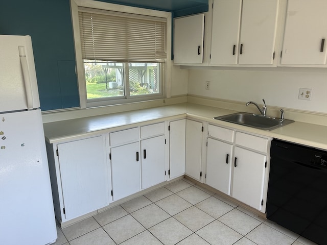 kitchen featuring white cabinetry, dishwasher, white fridge, and sink