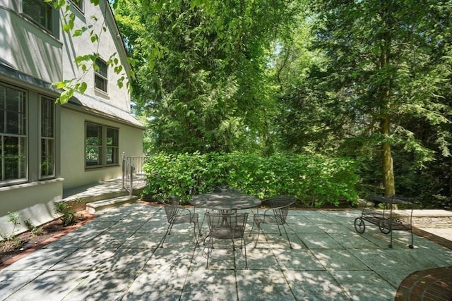 view of patio featuring outdoor dining space