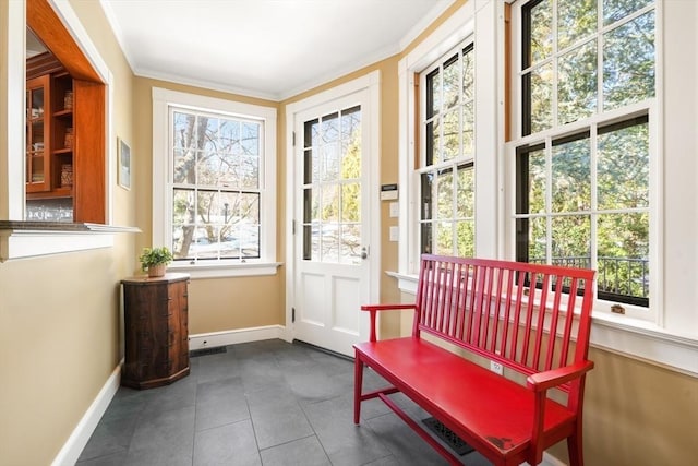 sunroom with plenty of natural light and visible vents