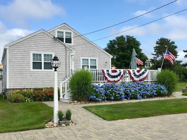 exterior space with a front yard