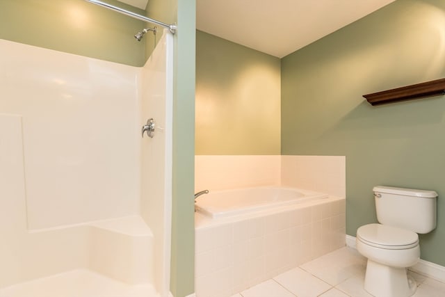 bathroom featuring tile patterned flooring, toilet, and plus walk in shower