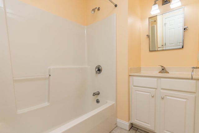 bathroom with tile patterned floors, vanity, and shower / bath combination