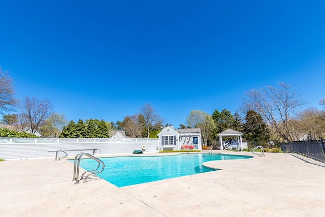 view of pool featuring a gazebo and a patio