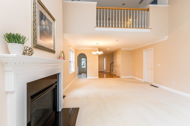 living room with light colored carpet and crown molding