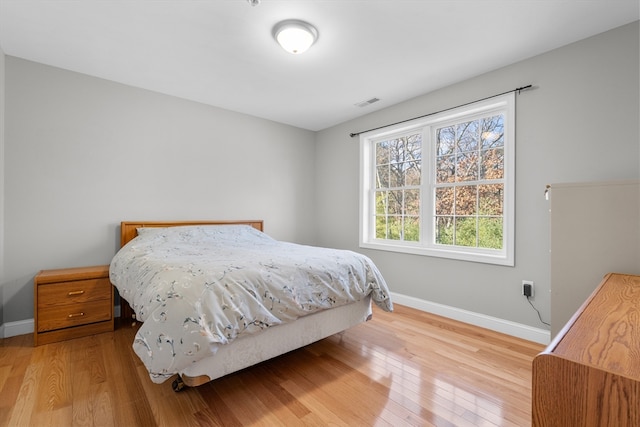 bedroom featuring light hardwood / wood-style flooring