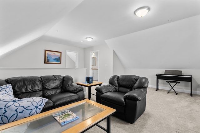 living room featuring light carpet and vaulted ceiling