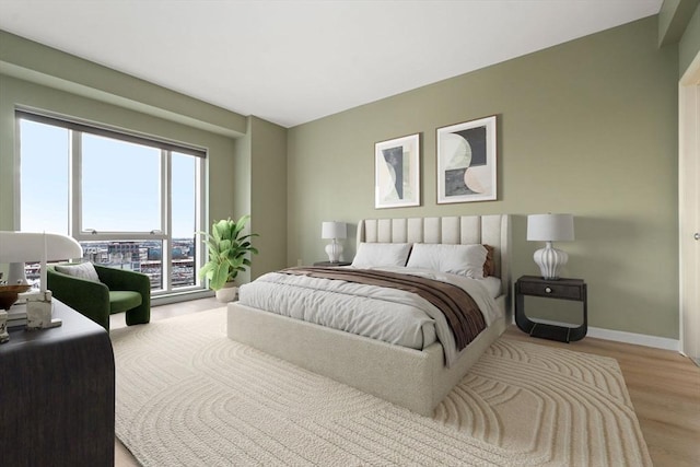 1 Nassau St Unit 2105, Boston, MA 02111 - bedroom with baseboards and wood finished floors