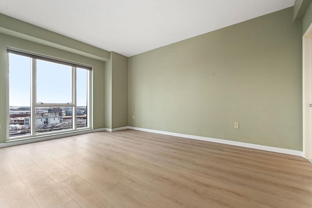 1 Nassau St Unit 2105, Boston, MA 02111 - empty room featuring light wood-style flooring and baseboards