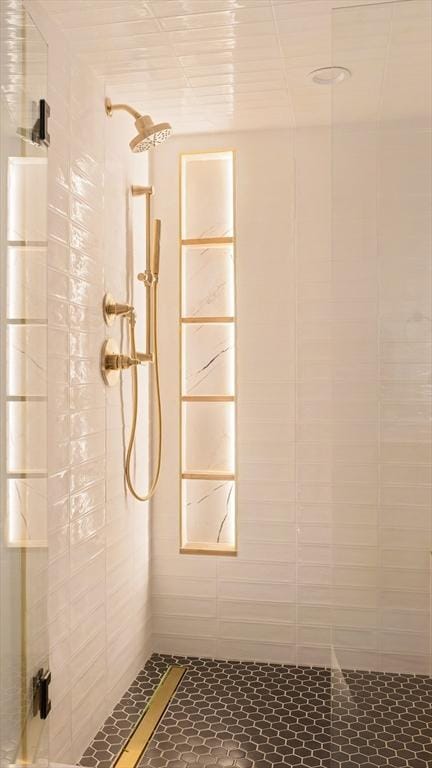 bathroom with a shower stall