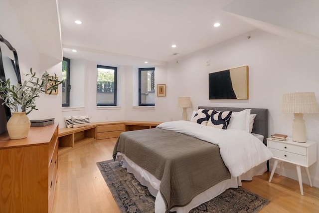 bedroom featuring light wood-style floors and recessed lighting