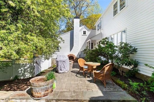 view of patio with fence