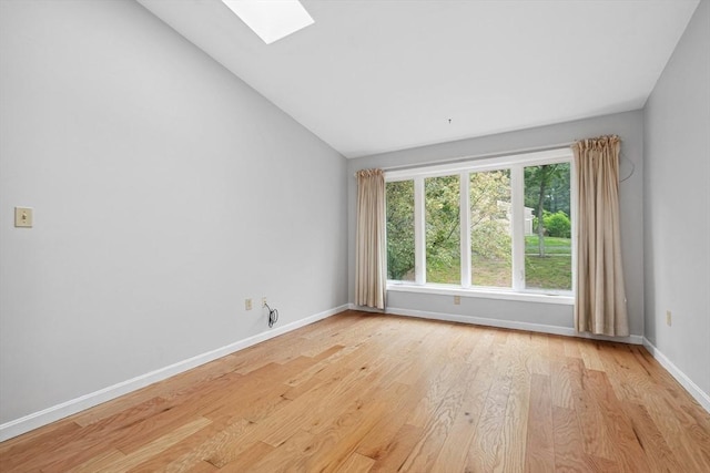 51 Nottingham Rd Unit 51, Grafton, MA 01519 - empty room with a skylight, lofted ceiling, and light wood-style floors