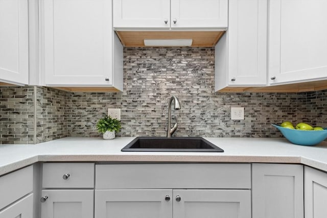 51 Nottingham Rd Unit 51, Grafton, MA 01519 - kitchen with white cabinetry, light countertops, and decorative backsplash