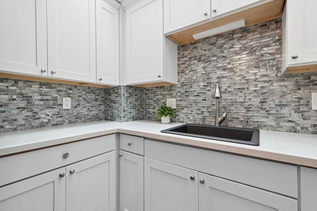 51 Nottingham Rd Unit 51, Grafton, MA 01519 - kitchen with light countertops, white cabinets, and backsplash