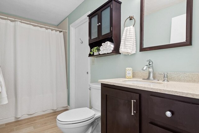 51 Nottingham Rd Unit 51, Grafton, MA 01519 - bathroom featuring vanity, wood finished floors, and shower / bath combo with shower curtain
