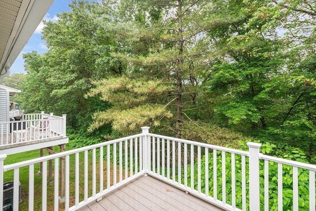 51 Nottingham Rd Unit 51, Grafton, MA 01519 - wooden deck featuring view of scattered trees