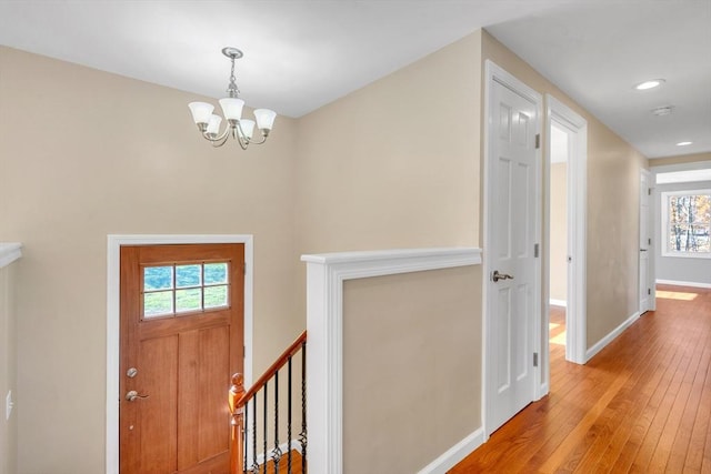531 Old N Rd, Worthington, MA 01098 - entryway featuring a chandelier, plenty of natural light, wood-type flooring, baseboards, and recessed lighting