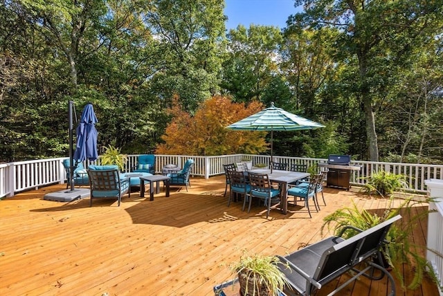 deck with outdoor dining space and outdoor lounge area