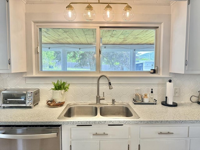 12 Wellington St, Buckland, MA 01370 - kitchen featuring dishwasher, a sink, light countertops, and white cabinets